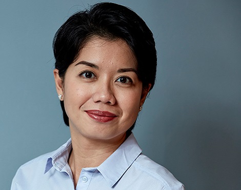 Karen Marcos, Senior Executive research, blue shirt, smiling